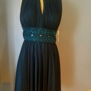 Black dress with teal accents